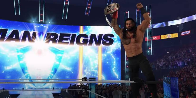 Roman lifting up his belt on a turnbuckle 