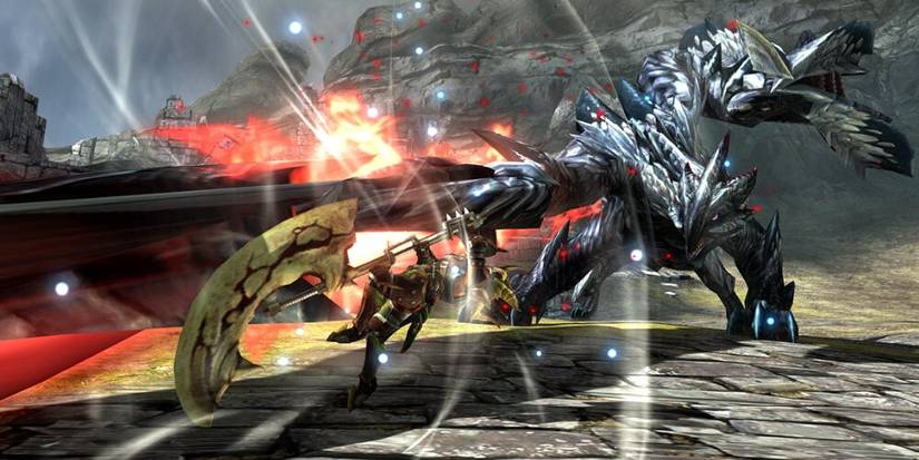 Hunter swiping a large sword at a dragon 