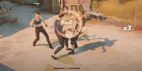 Character blocking an attack in Sifu 