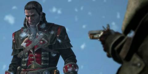 Shay with a gun aimed at him 