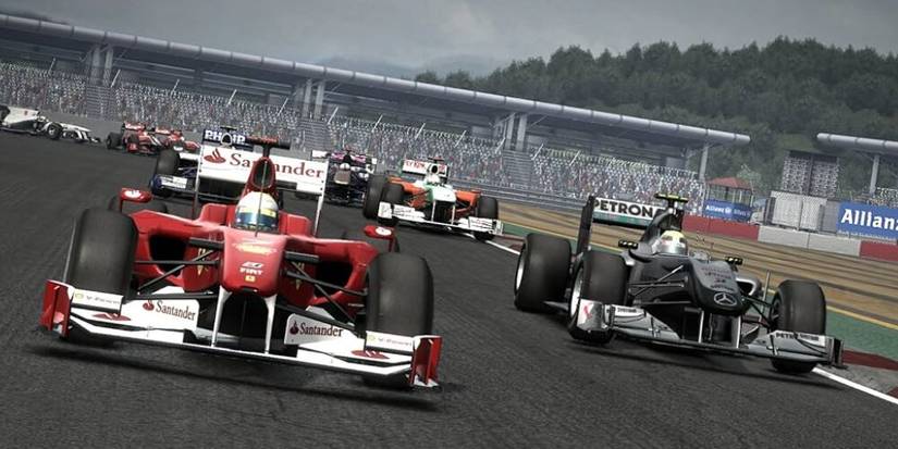 Multiple F1 cars racing alongside one another 