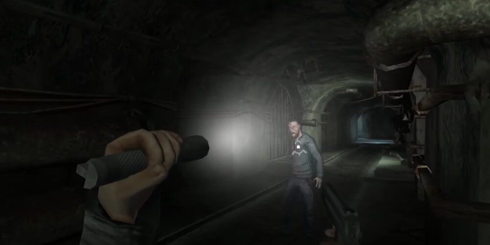 Player aiming a flashlight at a zombie 