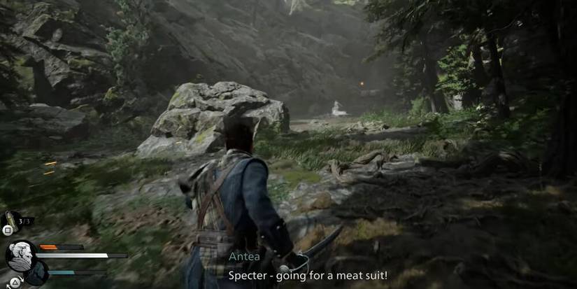 Red walking through a field with an enemy in the background 