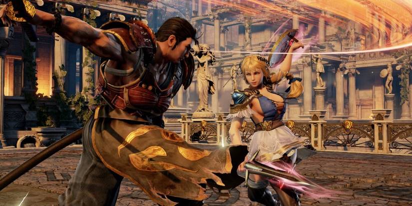 Man and woman slashing swords 