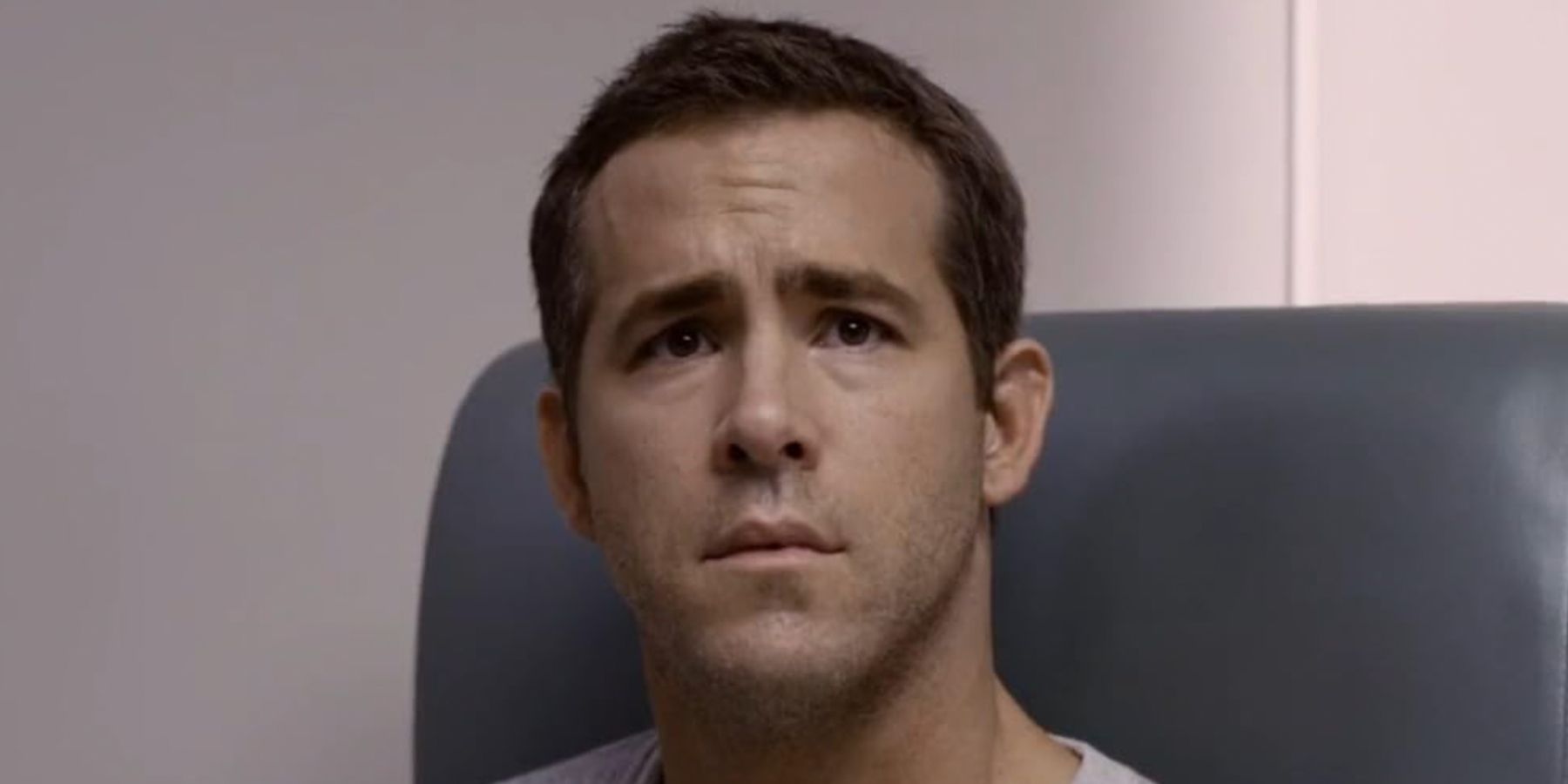 Ryan Reynolds looking serious in Self/Less