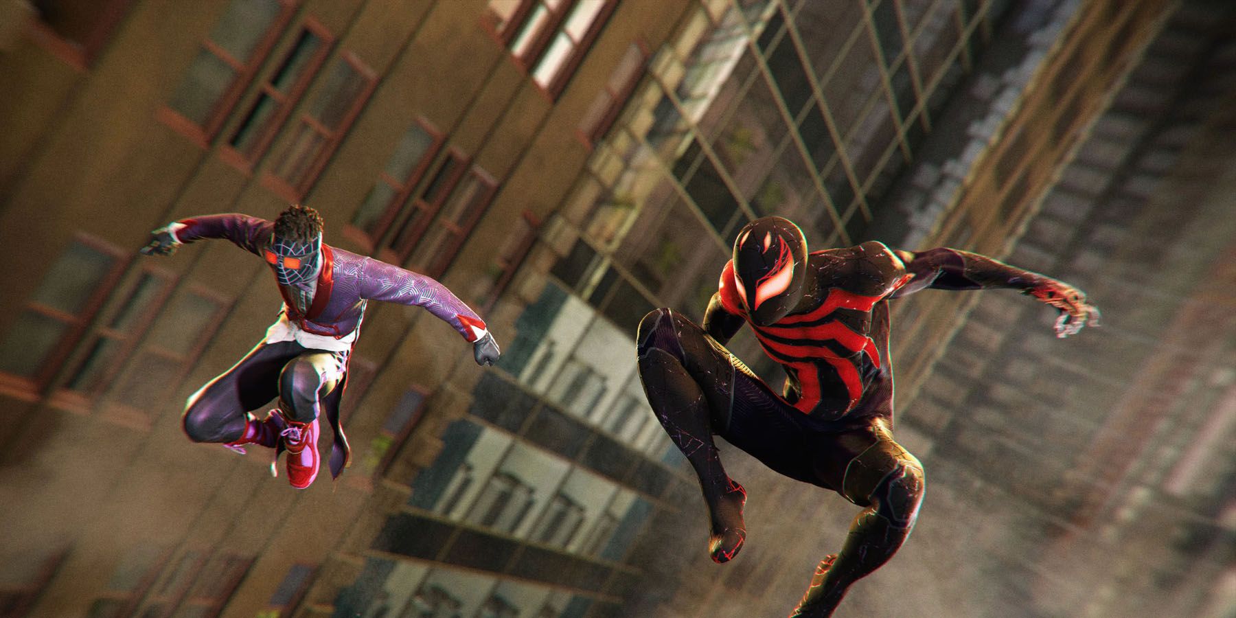 A screenshot of Peter and Miles wearing thier newest DLC costumes in Marvel's Spider-Man 2.