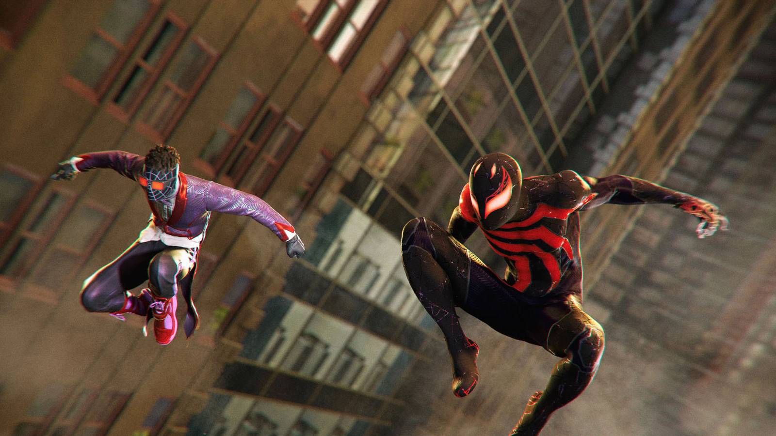 A screenshot of Peter and Miles wearing thier newest DLC costumes in Marvel's Spider-Man 2.