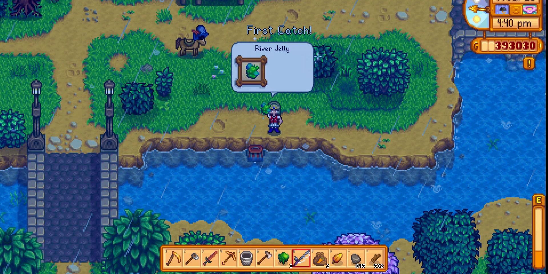 Image of a character after catching a river jelly in Stardew Valley