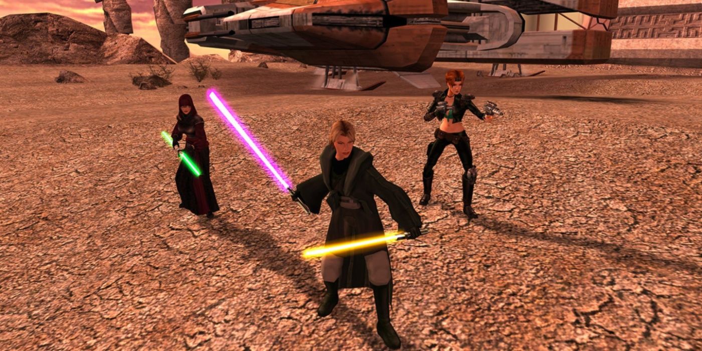 Three characters holding lightsabers from Star Wars: Knights Of The Old Republic.