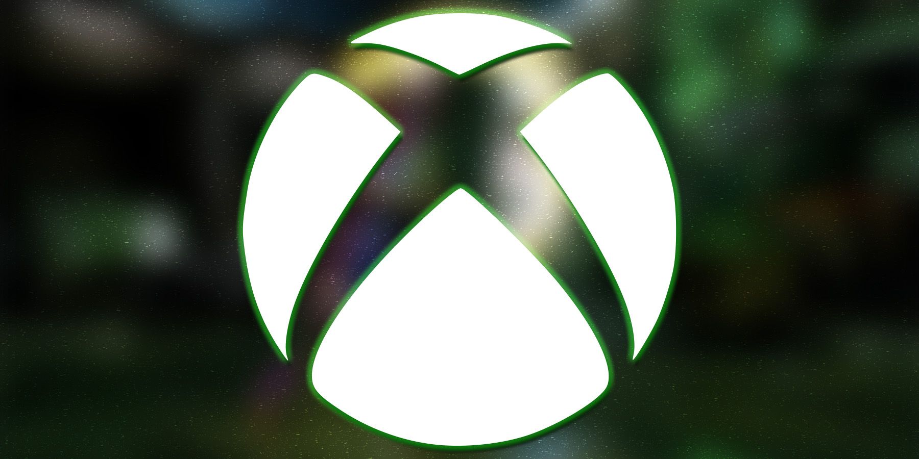 White Xbox logo emblem submark with green outer glow on blurred Killer Instinct Anniversary Edition screenshot