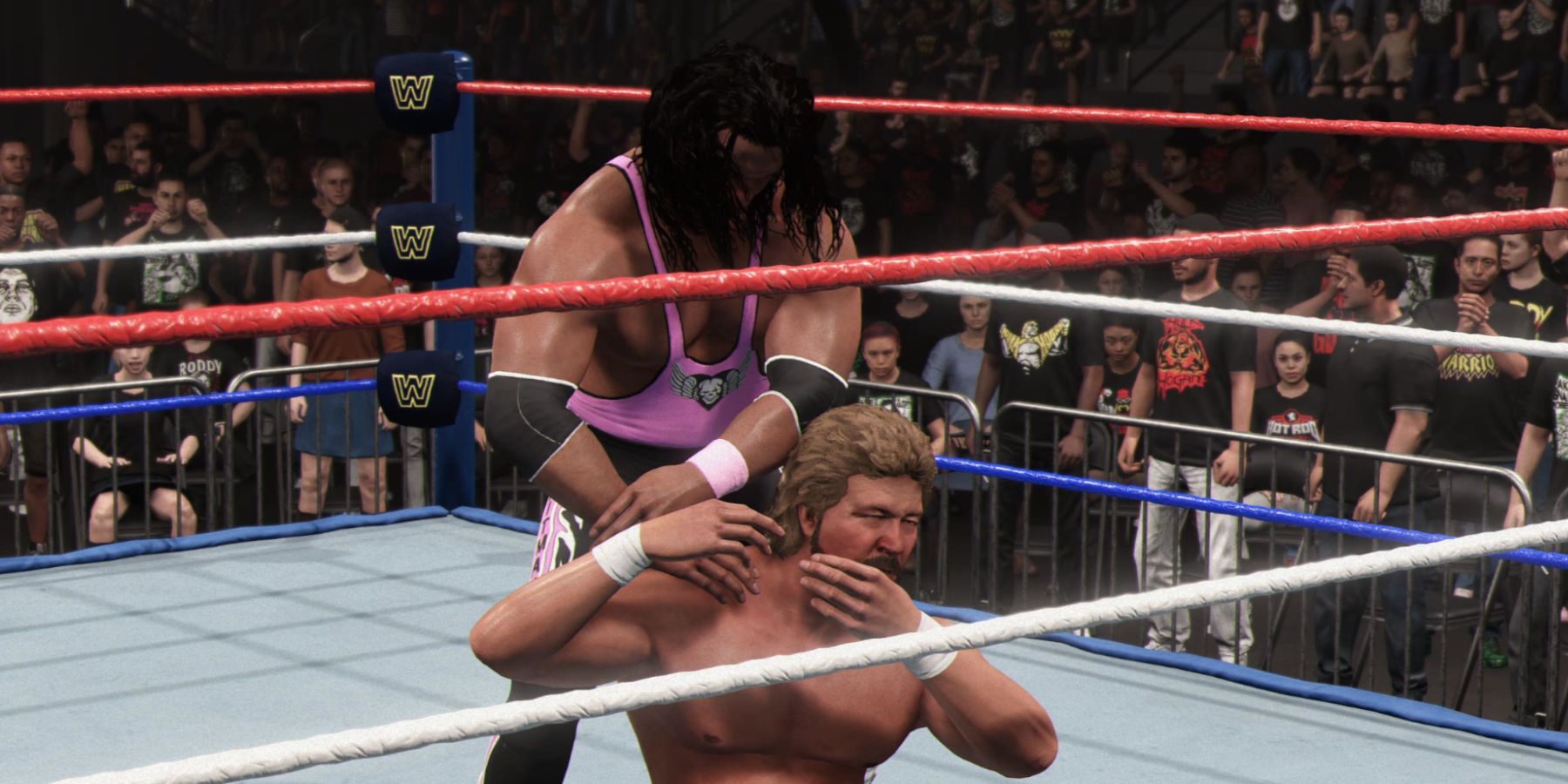 WWE 2K24 Bret Hart with the Shoulder Claw on the the Million Dollar Man-1