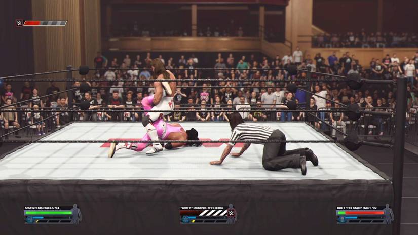 Bret Hart and Shawn Michaels in a match with Dom Mysterio as the referee in WWE 2K24