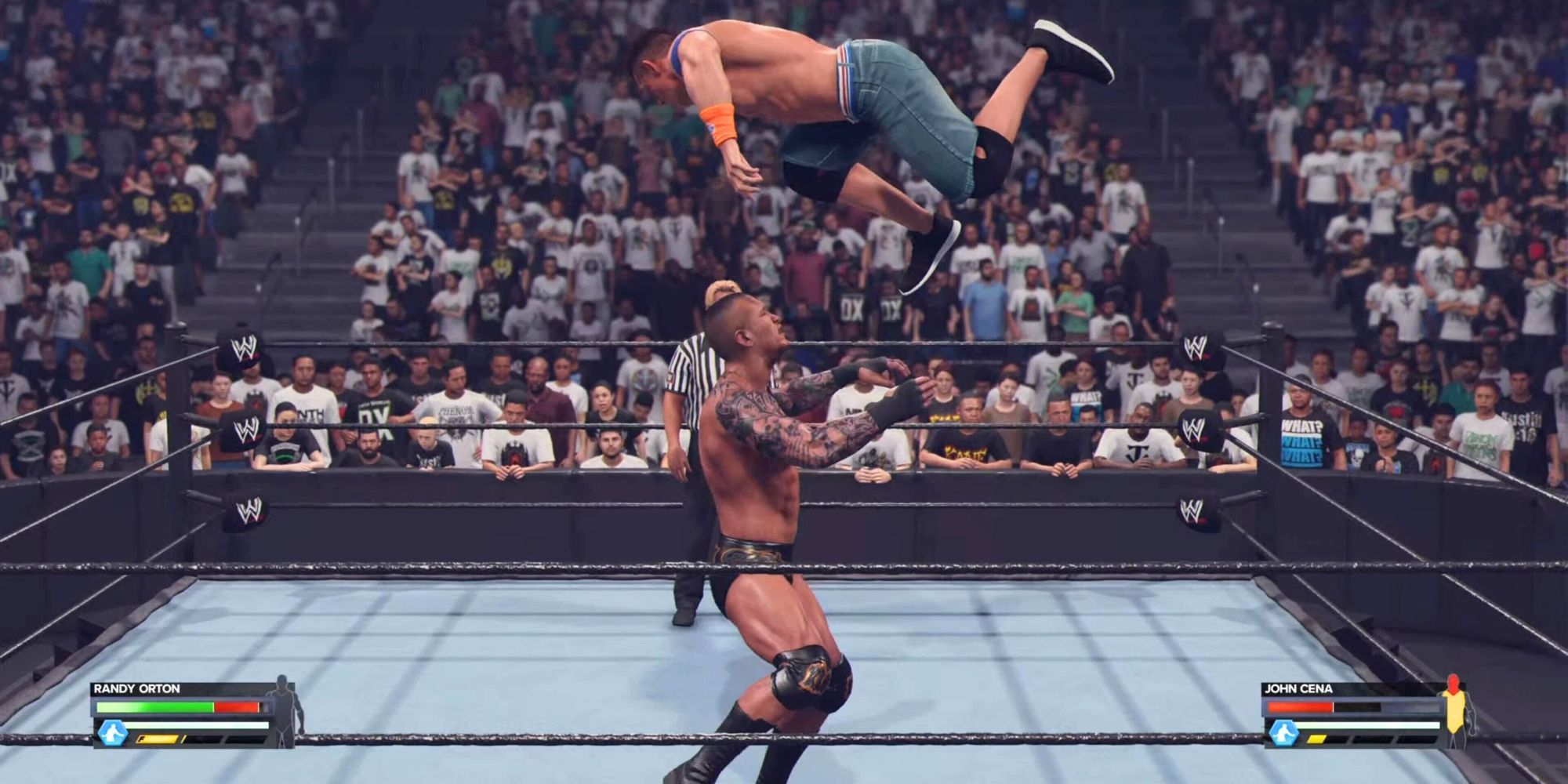 Randy Orton performing a Catch Finisher on John Cena in WWE 2K24