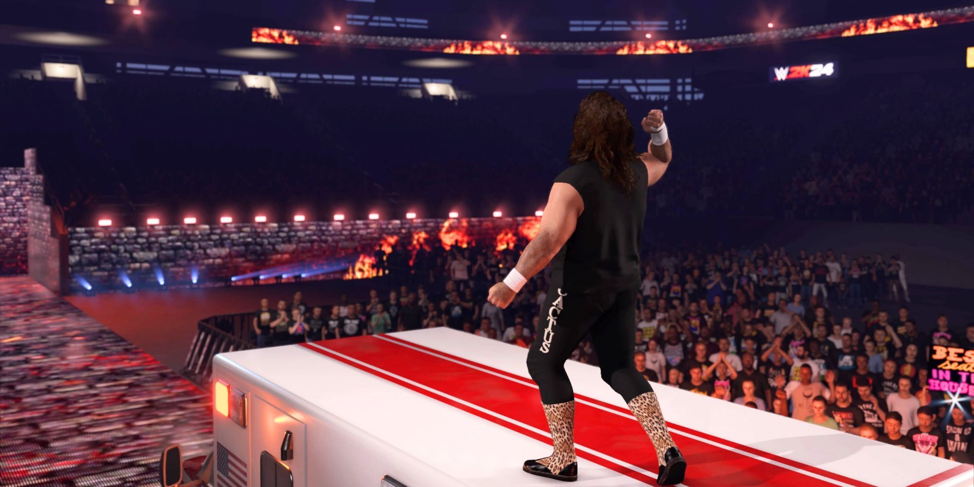 Cactus Jack standing on top of an ambulance in WWE 2K24