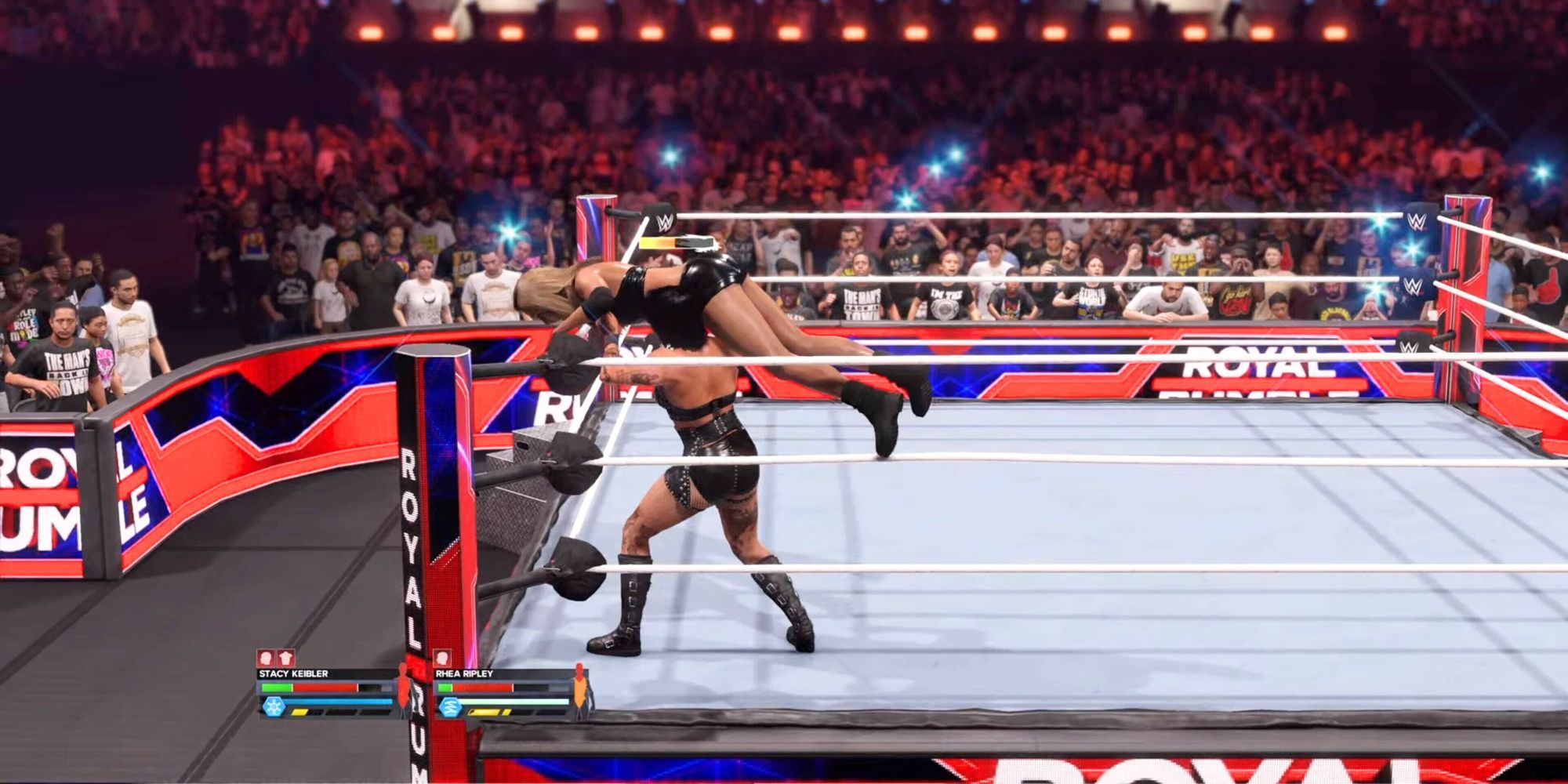 Rhea Ripley eliminating Stacey Kiebler in WWE 2K24