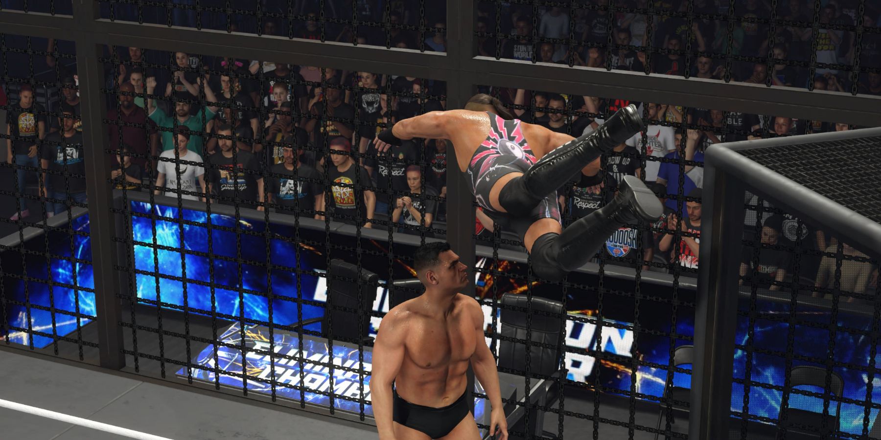 WWE 2K24 RVD diving from the pod in the Elimination Chamber