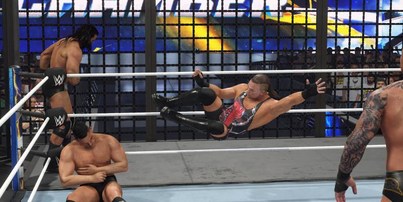 WWE 2K24  RVD with the drop kick in the Elimination Chamber