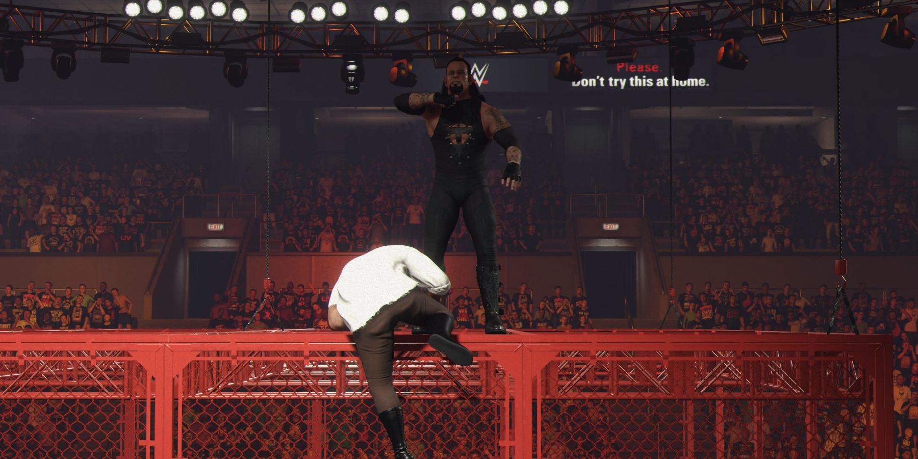 WWE 2K24 Undertaker taunting Mankind on top of the Cell