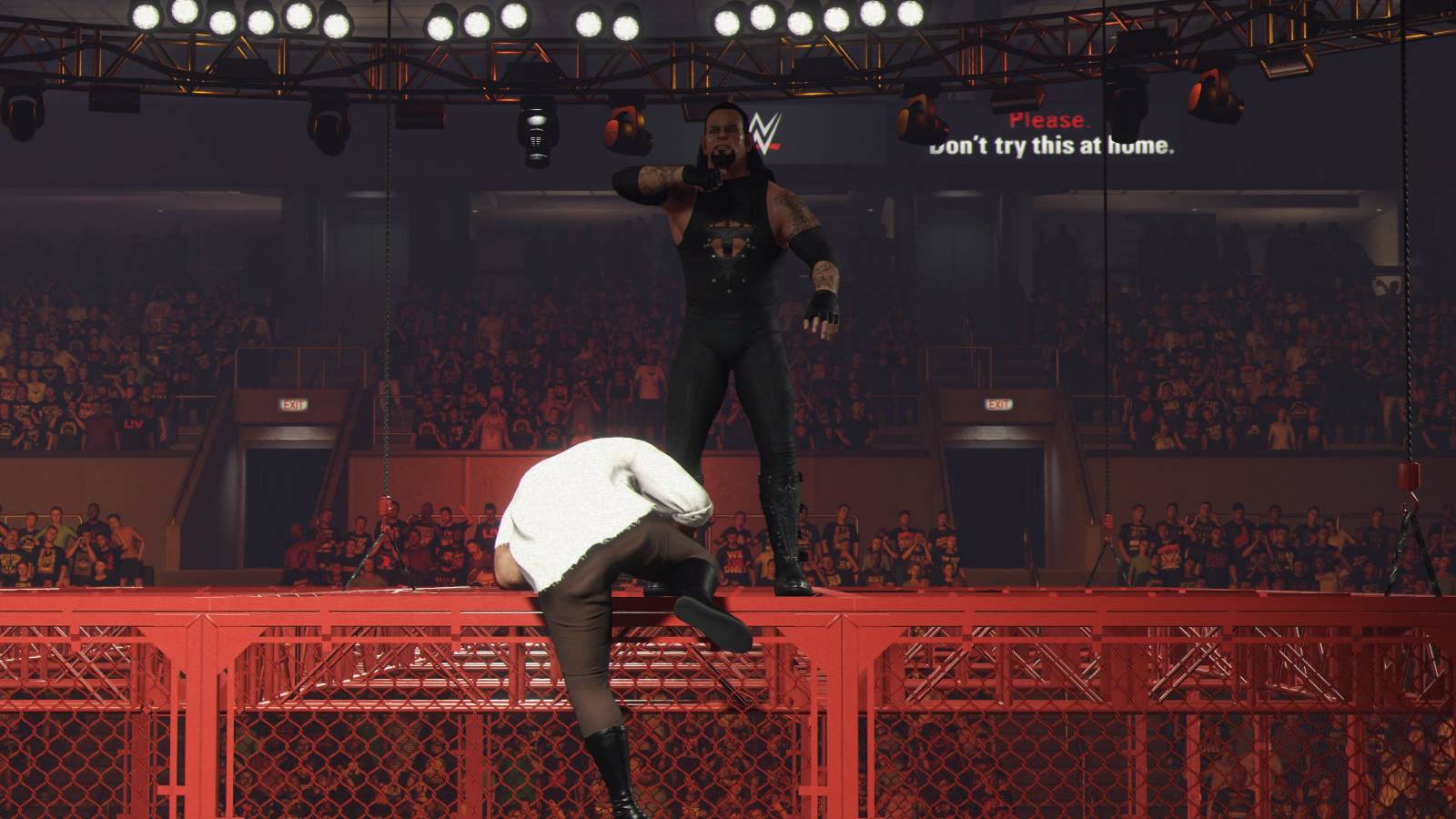 WWE 2K24 Undertaker taunting Mankind on top of the Cell