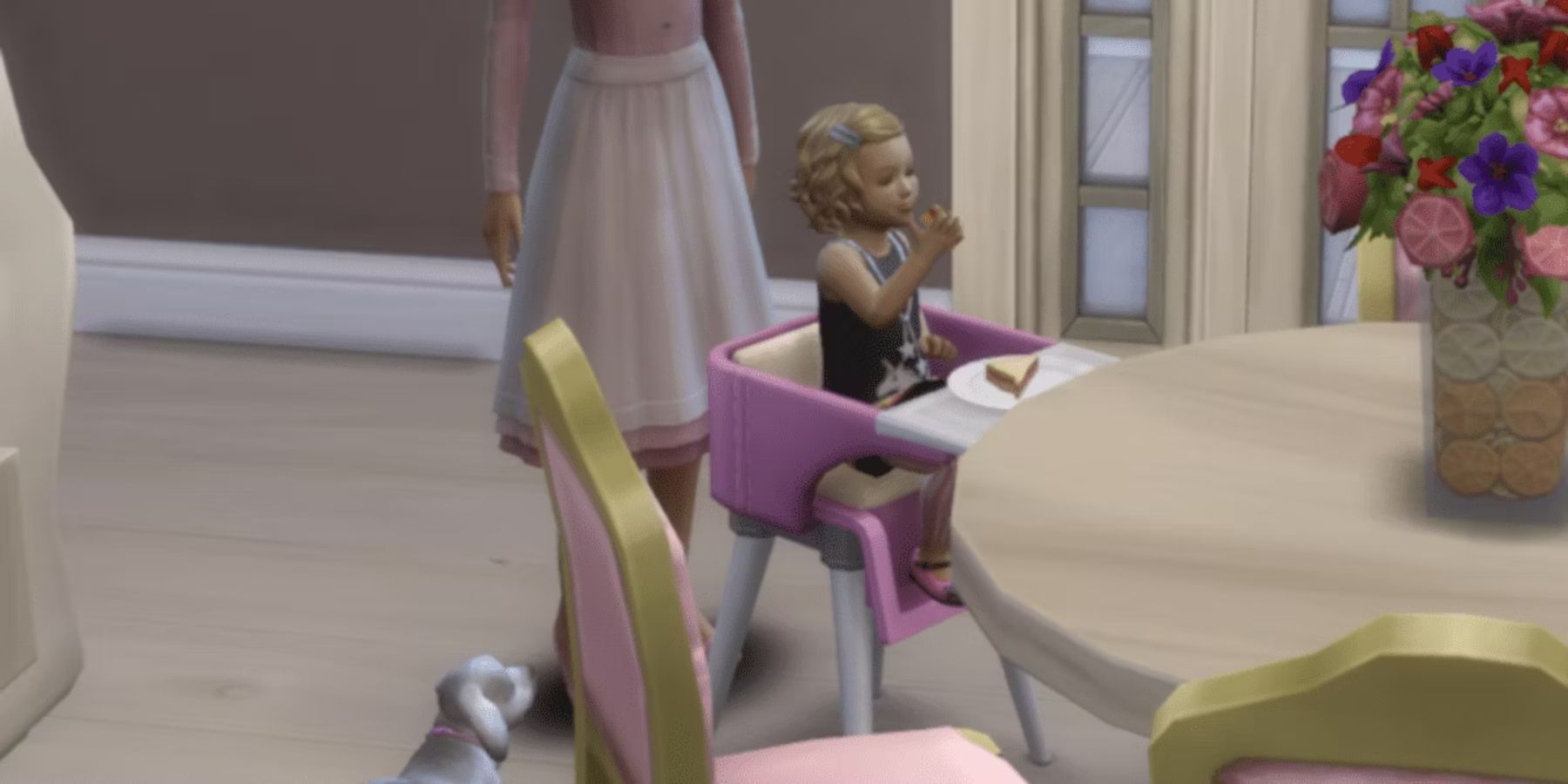 A toddler eating in The Sims 4