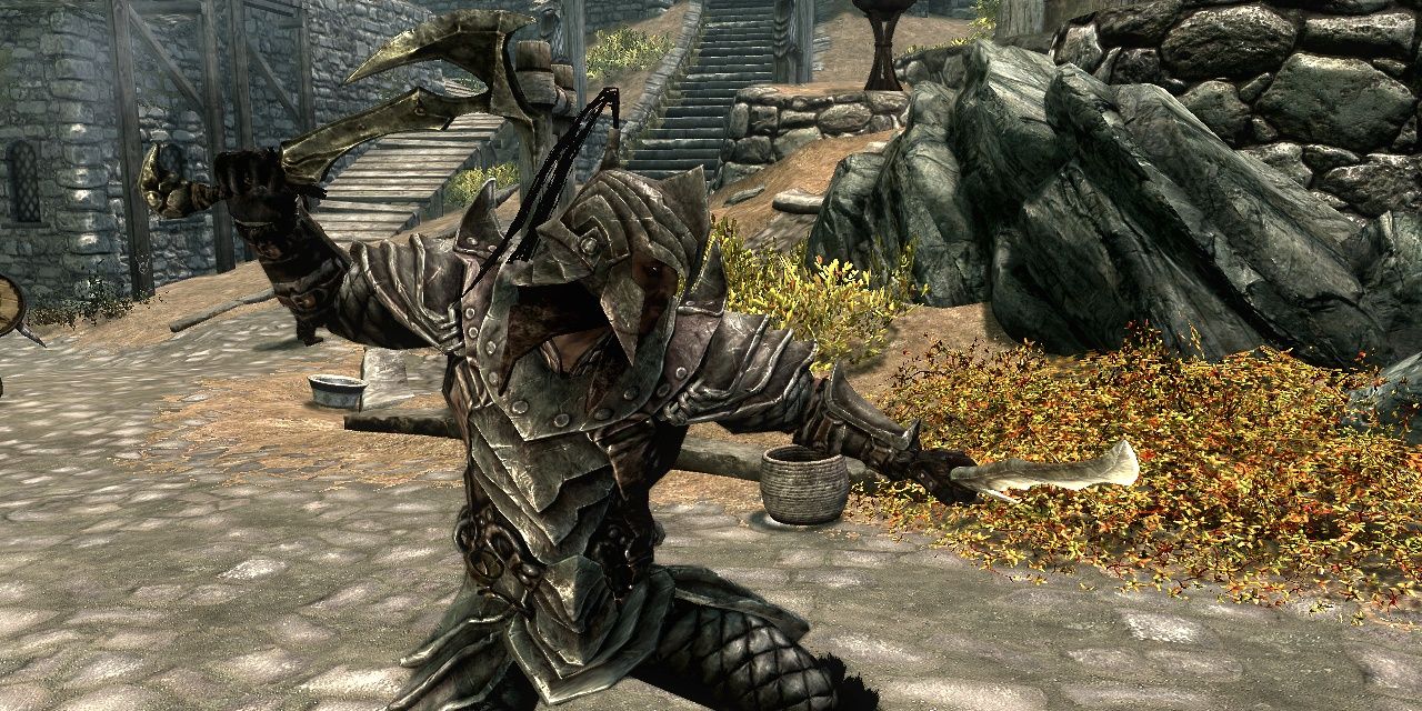 A warrior dual-wielding Orcish Daggers in Skyrim