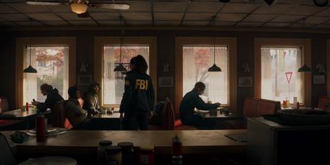 Saga Anderson investigating a diner in Alan Wake 2