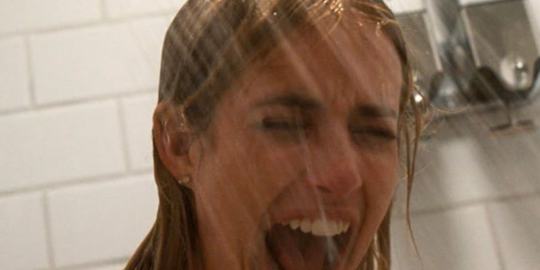 Anna (Emma Roberts) screaming in the shower in American Horror Story: Delicate