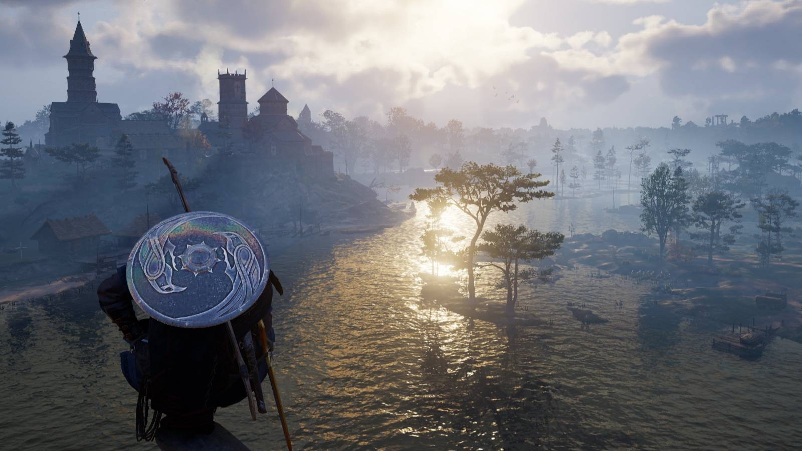 Eivor scoping out a monastary in Assassin's Creed Valhalla