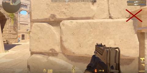Image of a character peeking around the corner from up close in Counter Strike 2