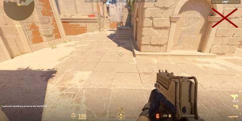 Image of a character aiming their crosshair towards the ground in Counter Strike 2