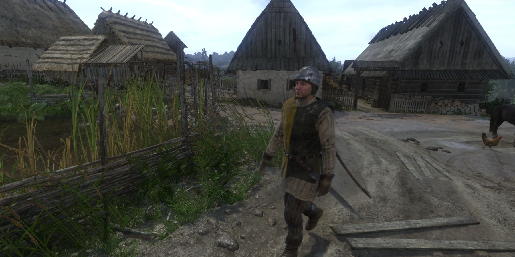 Guard walking around town in Kingdom Come: Deliverance