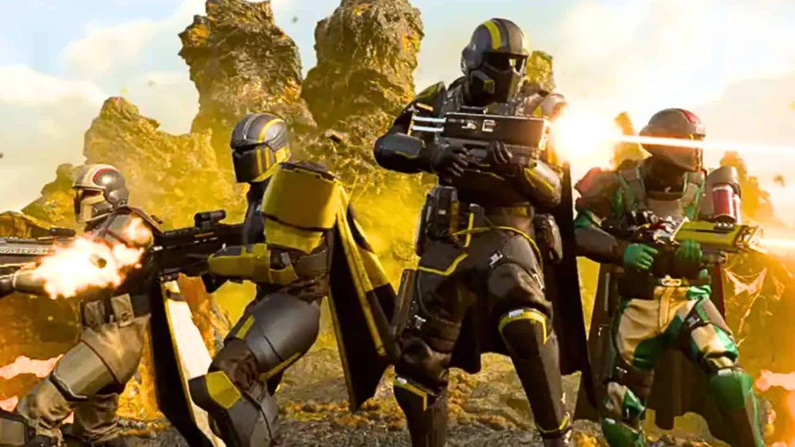 helldivers 2 promo art of a four player squad standing close and opening fire