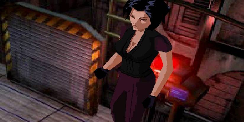 hana standing in front of a blinking control panel