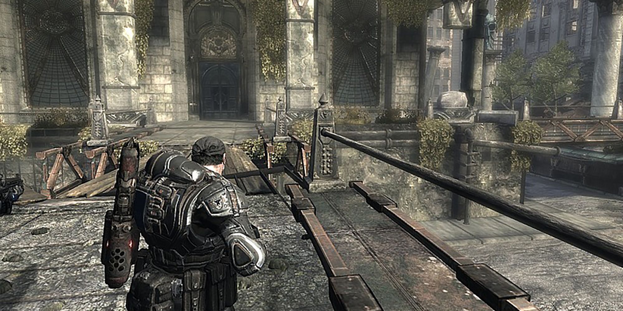 A Gears of War characters looking toward a building 
