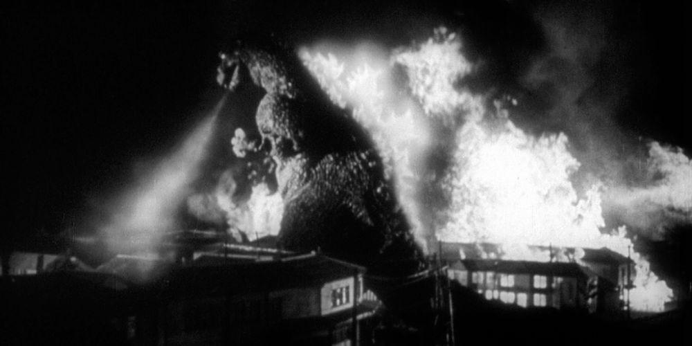 Godzilla burns down Tokyo with his atomic breath.