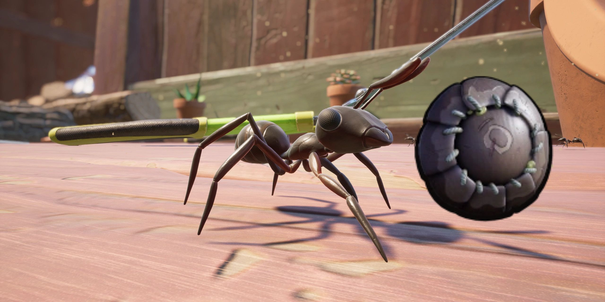 A Black Worker Ant in Grounded next to the Black Ant Shield