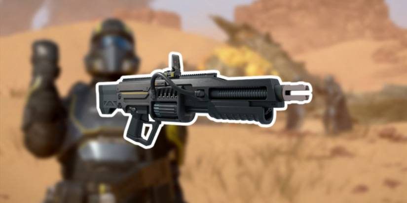 Helldivers 2 ARC-12 Blitzer in foreground with helldiver posing in background