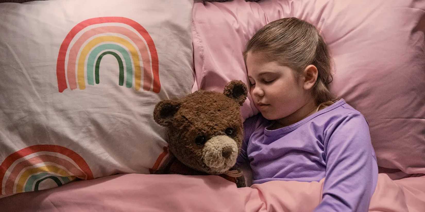 Chauncey the bear and Alice lying in bed in Imaginary