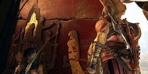 Kratos and Atreus looking at the mural in God of War 2018