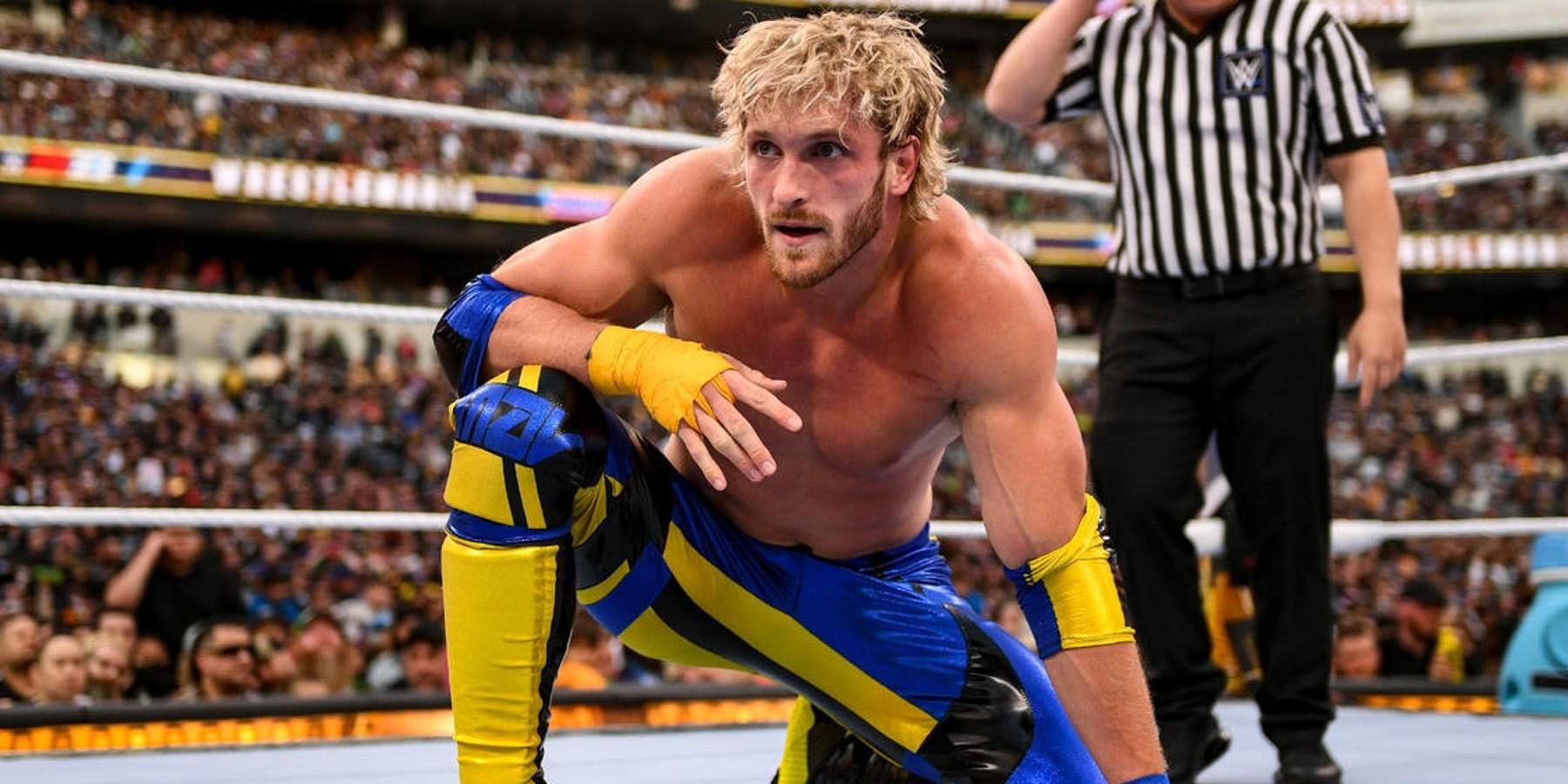 A screenshot of Logan Paul crouching in the ring at a WWE event.