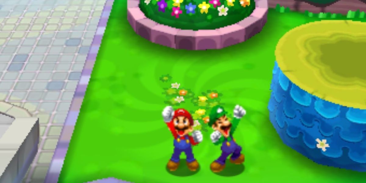 mario and luigi pumping their fists up in dream team