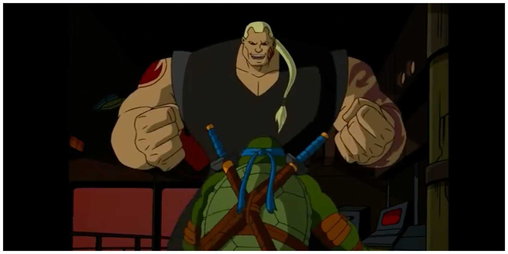 Hun standing over Leonardo, ready to fight