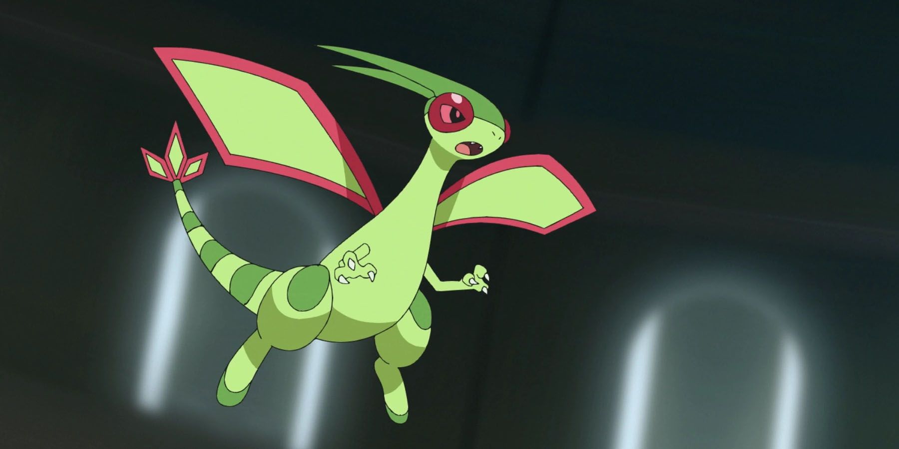 A screenshot of Flygon flying in a dark room in the Pokemon anime.
