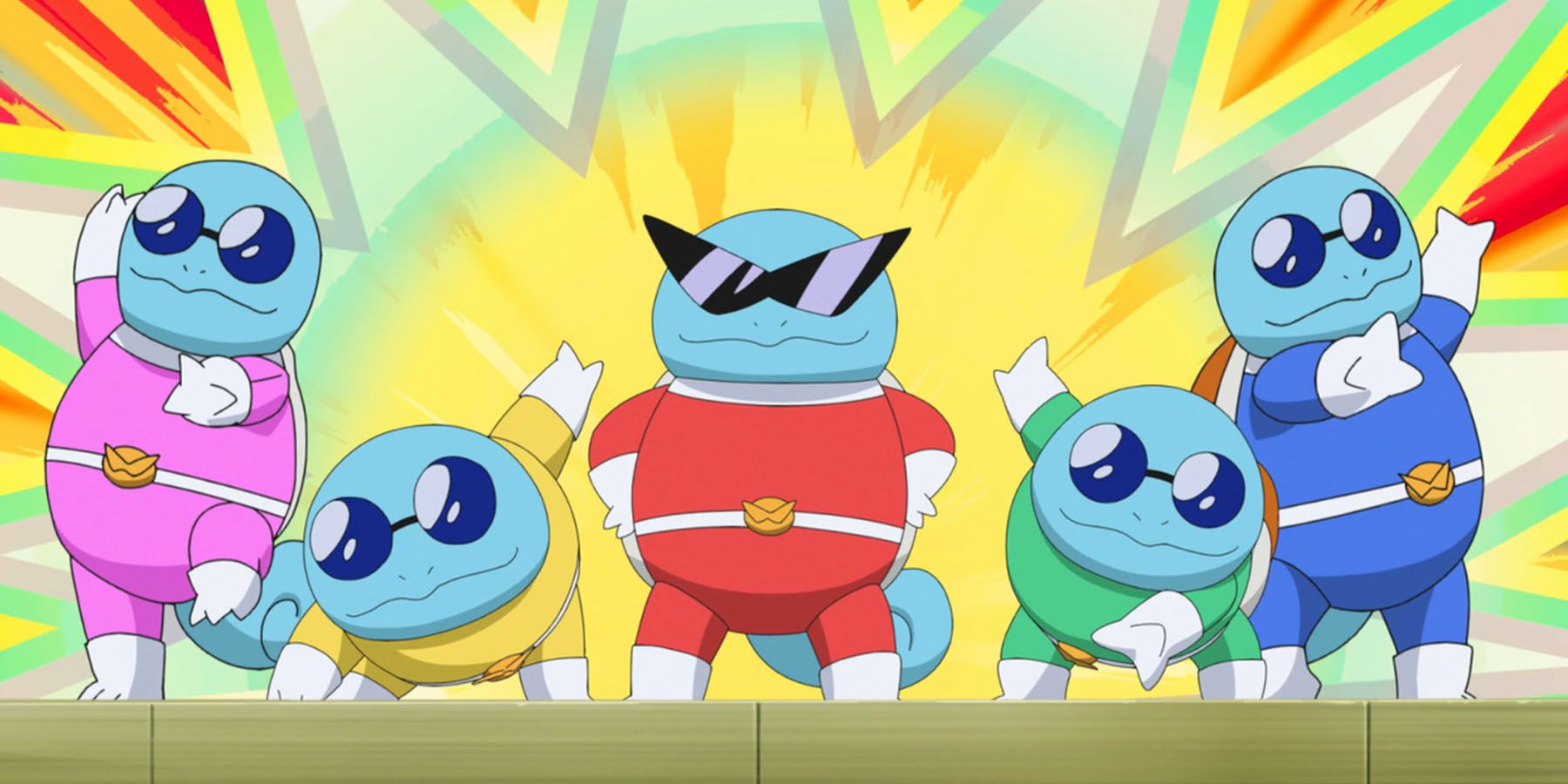 A screenshot of the Squirtle Squad wearing colorful Power Rangers-inspired outfits in the Pokemon anime.