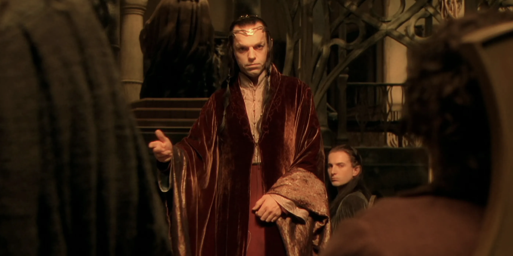 Elrond addressing the council with Erestor behind