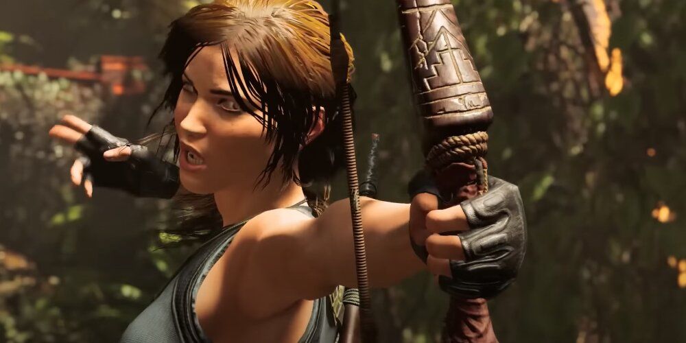 Lara letting go of her bow string 