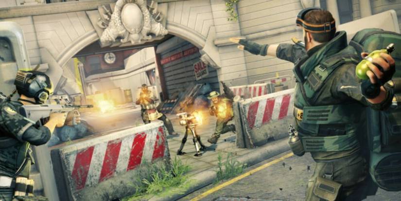 Soldiers firing at one another on a battlefield with a turret in the background 