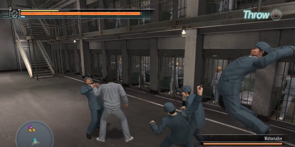 Saejima grabbing a guard while another lunges at hum from behind 