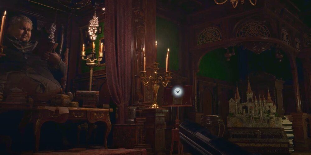Cansle lit room with the Duke on the left and a small castle puzzle on the right 