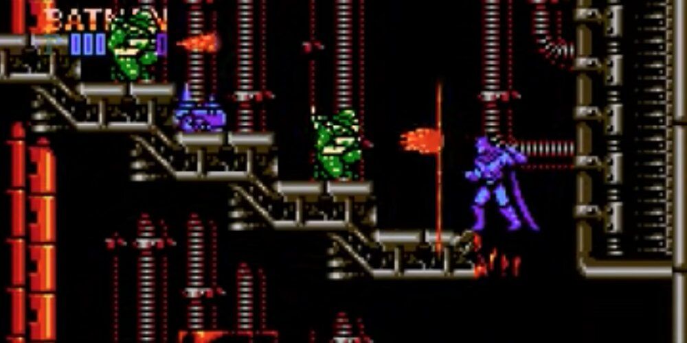 Batman jumping on a platform with three enemies firing at him in Batman: The Video Game
